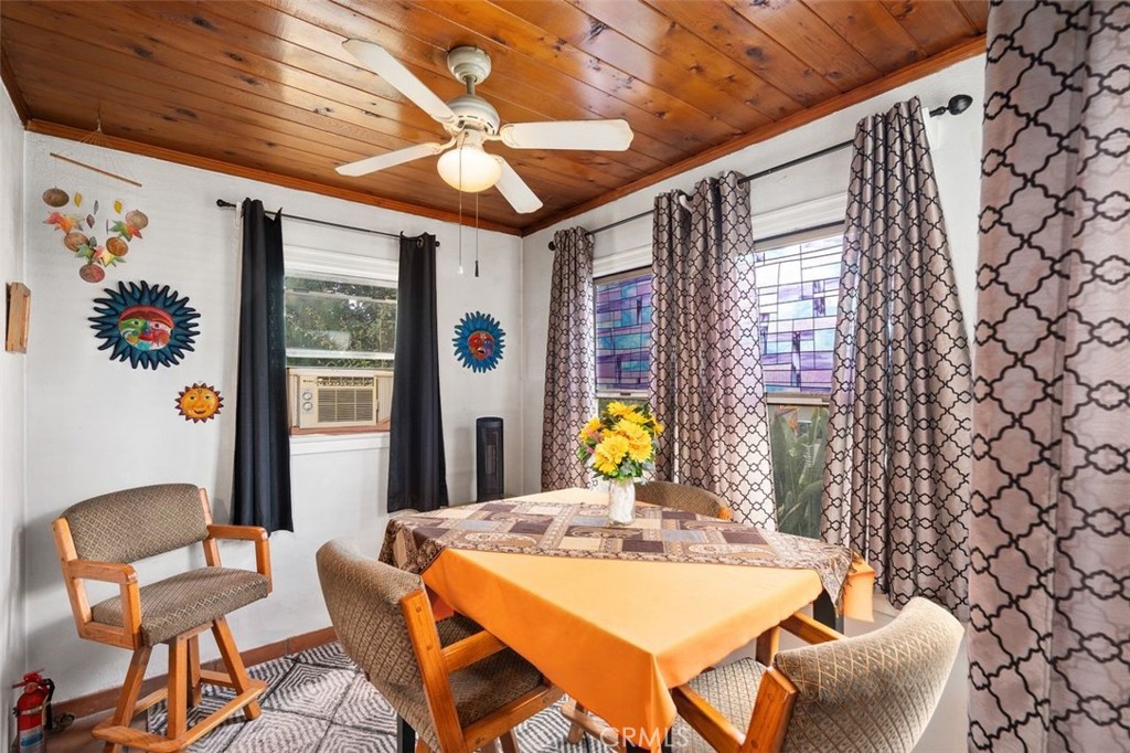 330 El Nido Avenue Pasadena, CA 91107 - Photo 13 of 41 a view of a dining room with furniture window and outside view