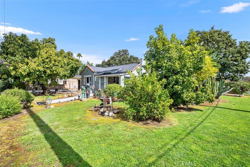 330 El Nido Avenue Pasadena, CA 91107 - Photo 15 of 41 a view of a house with a yard
