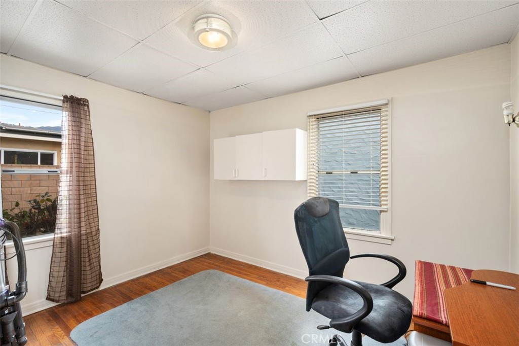 330 El Nido Avenue Pasadena, CA 91107 - Photo 22 of 41 a view of a workspace with furniture and a window