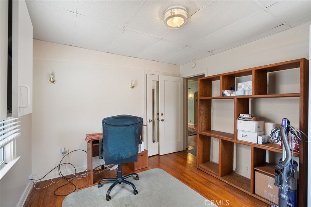 330 El Nido Avenue Pasadena, CA 91107 - Photo 23 of 41 a view of a workspace with furniture and wooden floor