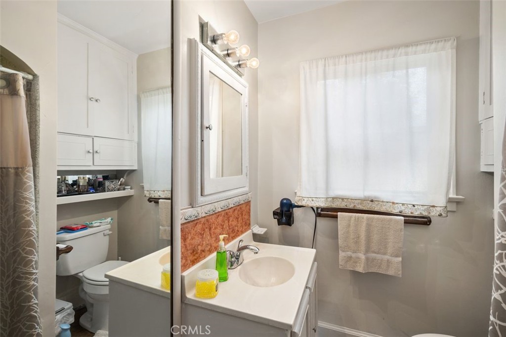 330 El Nido Avenue Pasadena, CA 91107 - Photo 28 of 41 a bathroom with a sink a toilet and shower