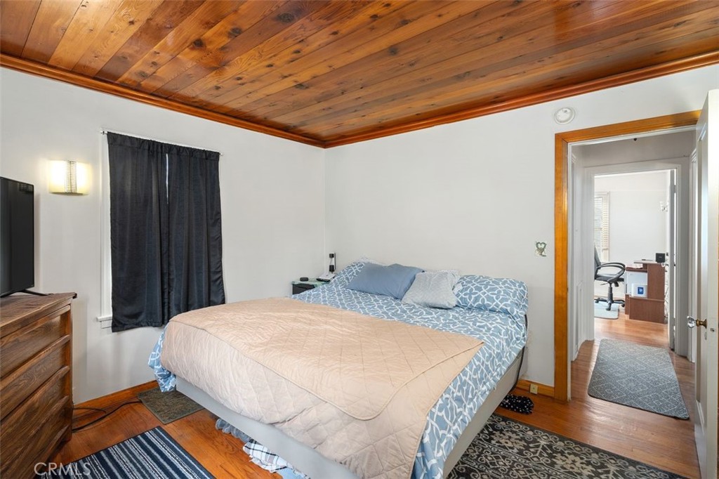 330 El Nido Avenue Pasadena, CA 91107 - Photo 30 of 41 a bedroom with a bed and a walk in closet