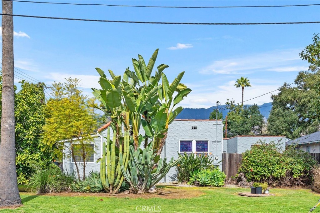 330 El Nido Avenue Pasadena, CA 91107 - Photo 34 of 41 a front view of a house with a yard
