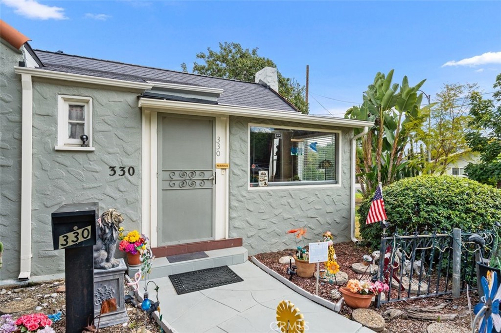 330 El Nido Avenue Pasadena, CA 91107 - Photo 5 of 41 a front view of a house with outdoor seating