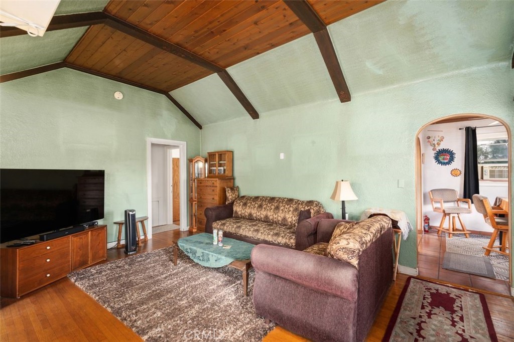 330 El Nido Avenue Pasadena, CA 91107 - Photo 7 of 41 a living room with furniture and a flat screen tv