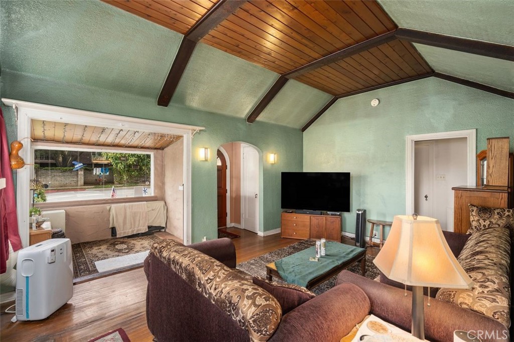 330 El Nido Avenue Pasadena, CA 91107 - Photo 8 of 41 a living room with furniture and a flat screen tv