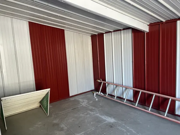 a view of an empty room with stairs