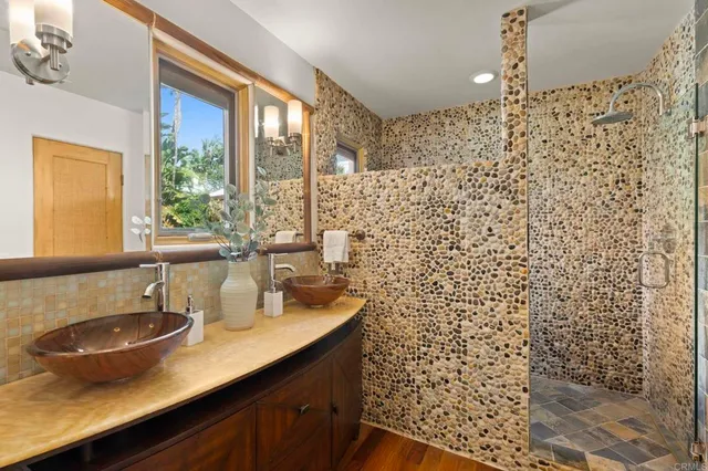 a view of a backyard with plants and a garden