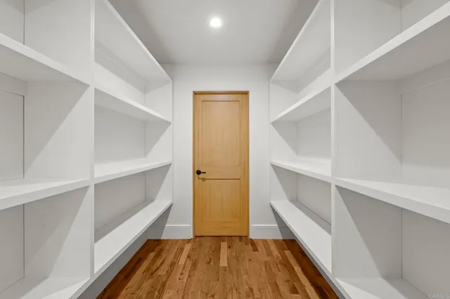 a view of a house with a yard porch and furniture