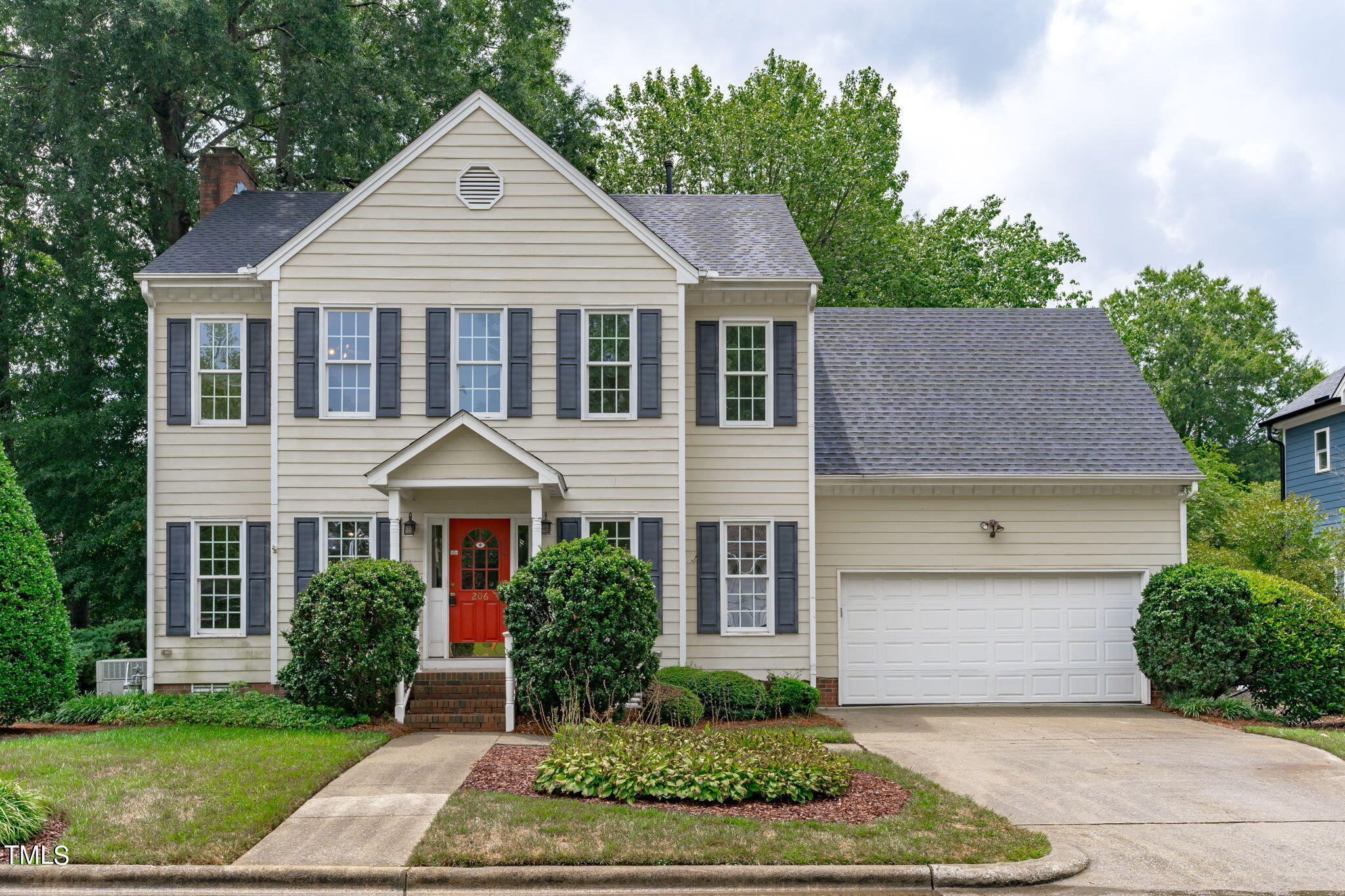 206 Palace Green Cary, NC 27518 - Photo 1 of 51 a front view of a house with a yard