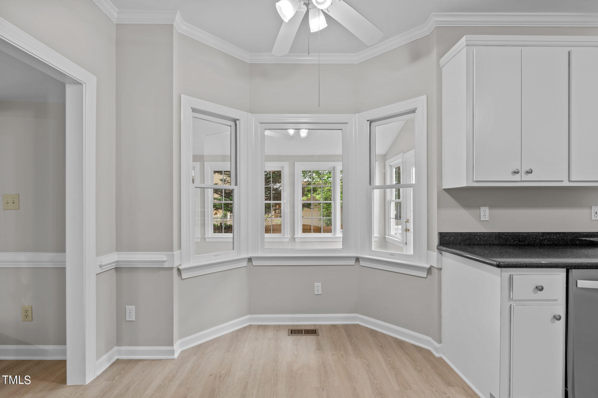206 Palace Green Cary, NC 27518 - Photo 14 of 51 a kitchen with a window and cabinets