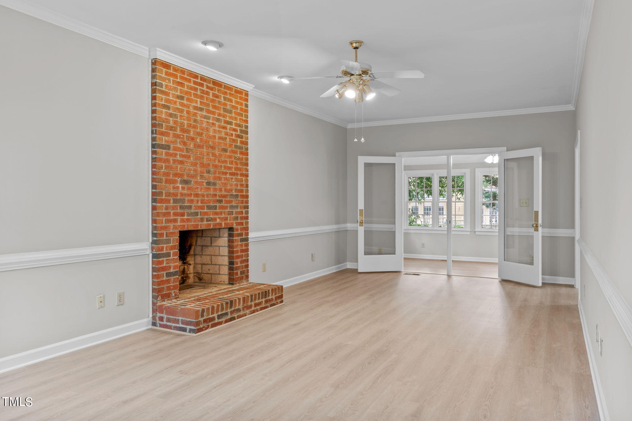 206 Palace Green Cary, NC 27518 - Photo 19 of 51 an empty room with windows and fireplace