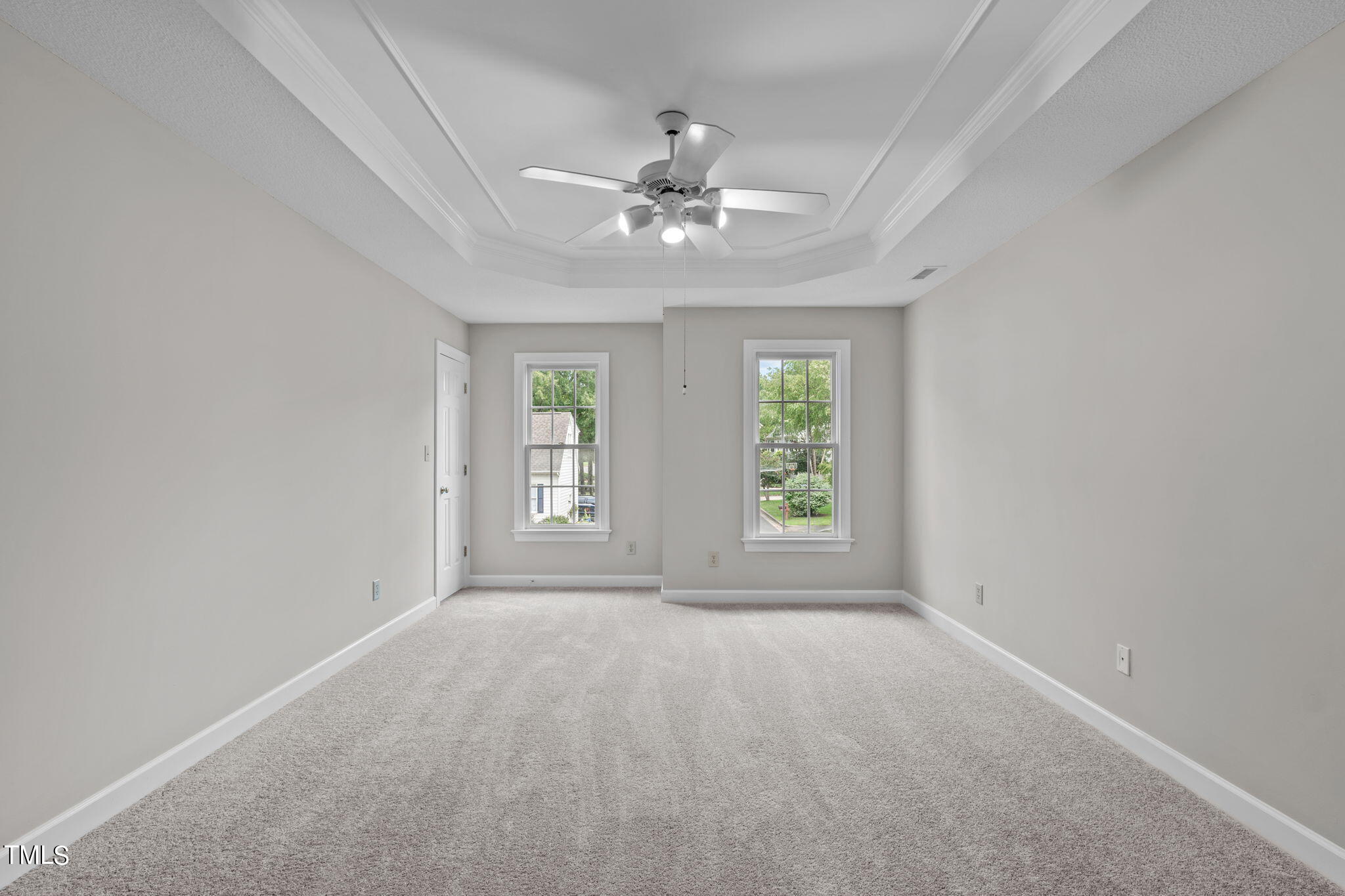 206 Palace Green Cary, NC 27518 - Photo 29 of 51 an empty room with windows and ceiling fan