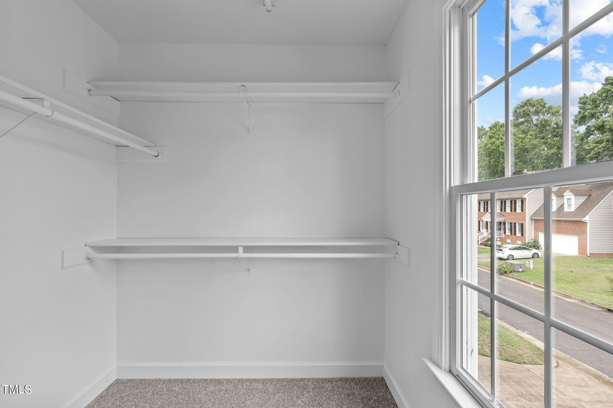 206 Palace Green Cary, NC 27518 - Photo 31 of 51 a view of an empty walk in closet