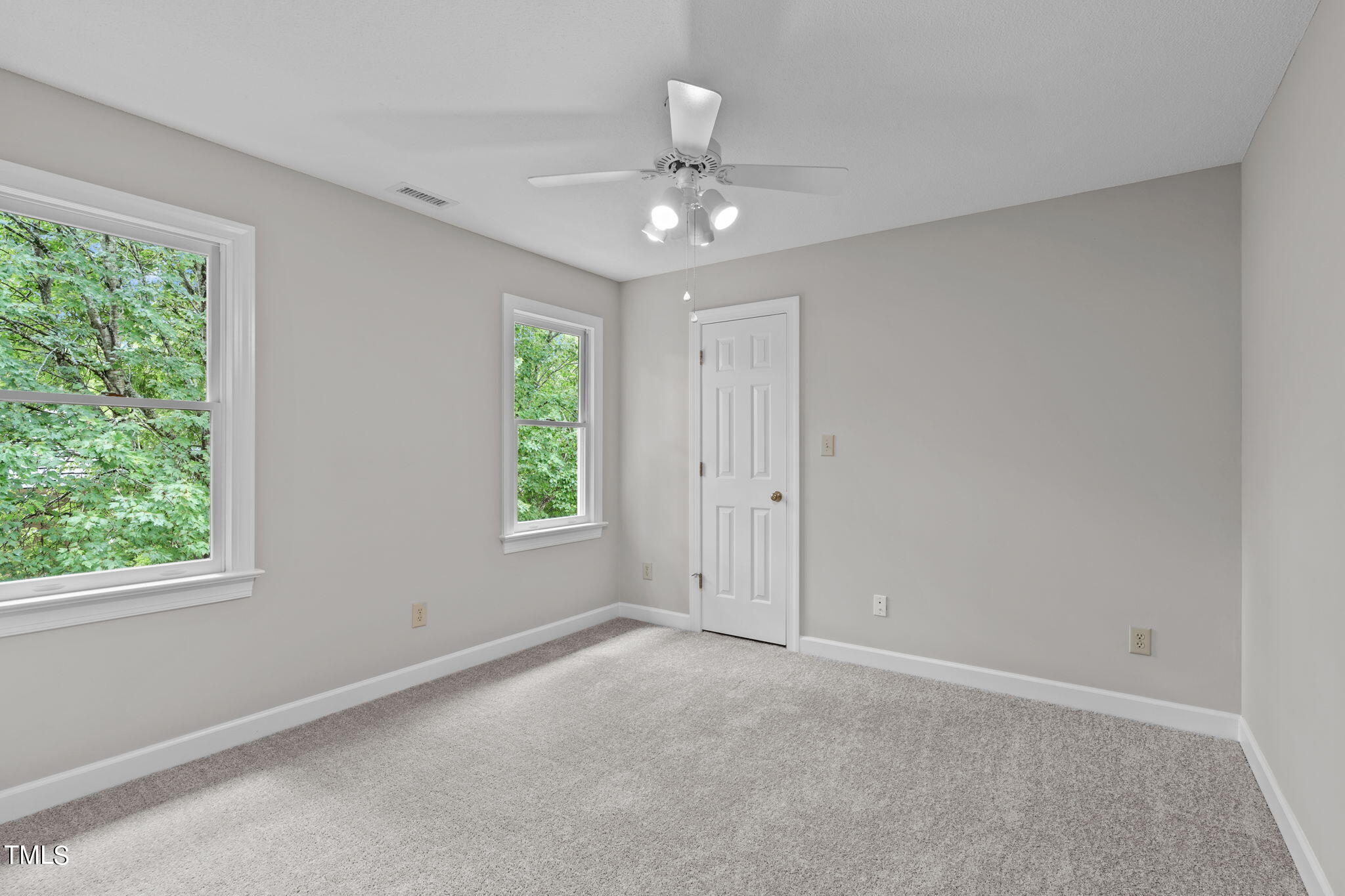 206 Palace Green Cary, NC 27518 - Photo 35 of 51 a view of an empty room with a window