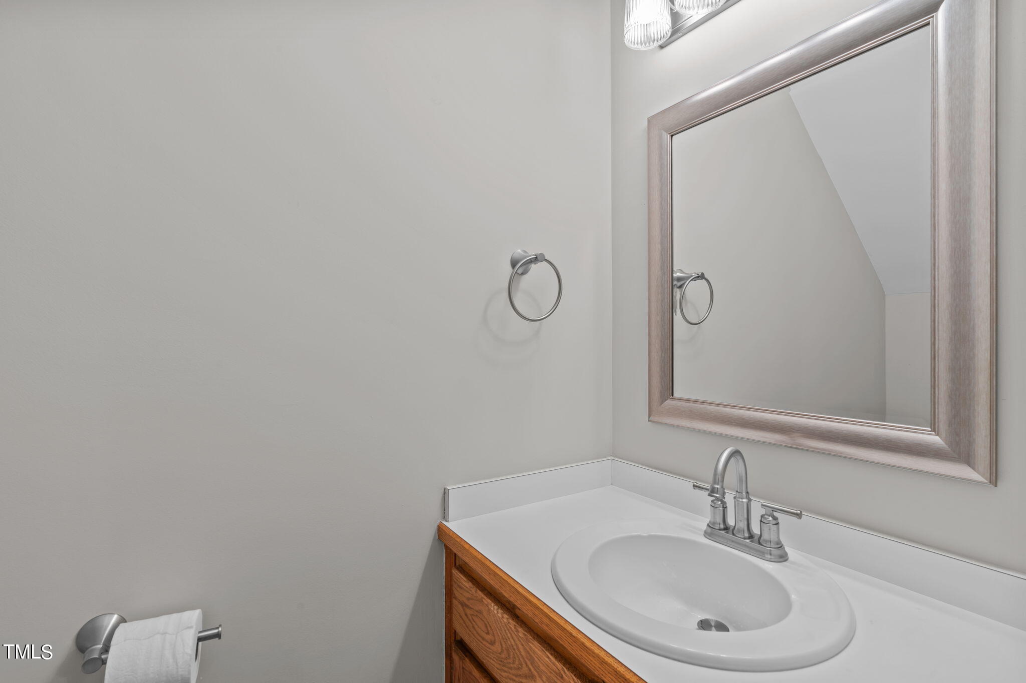 206 Palace Green Cary, NC 27518 - Photo 42 of 51 a bathroom with a sink and a mirror