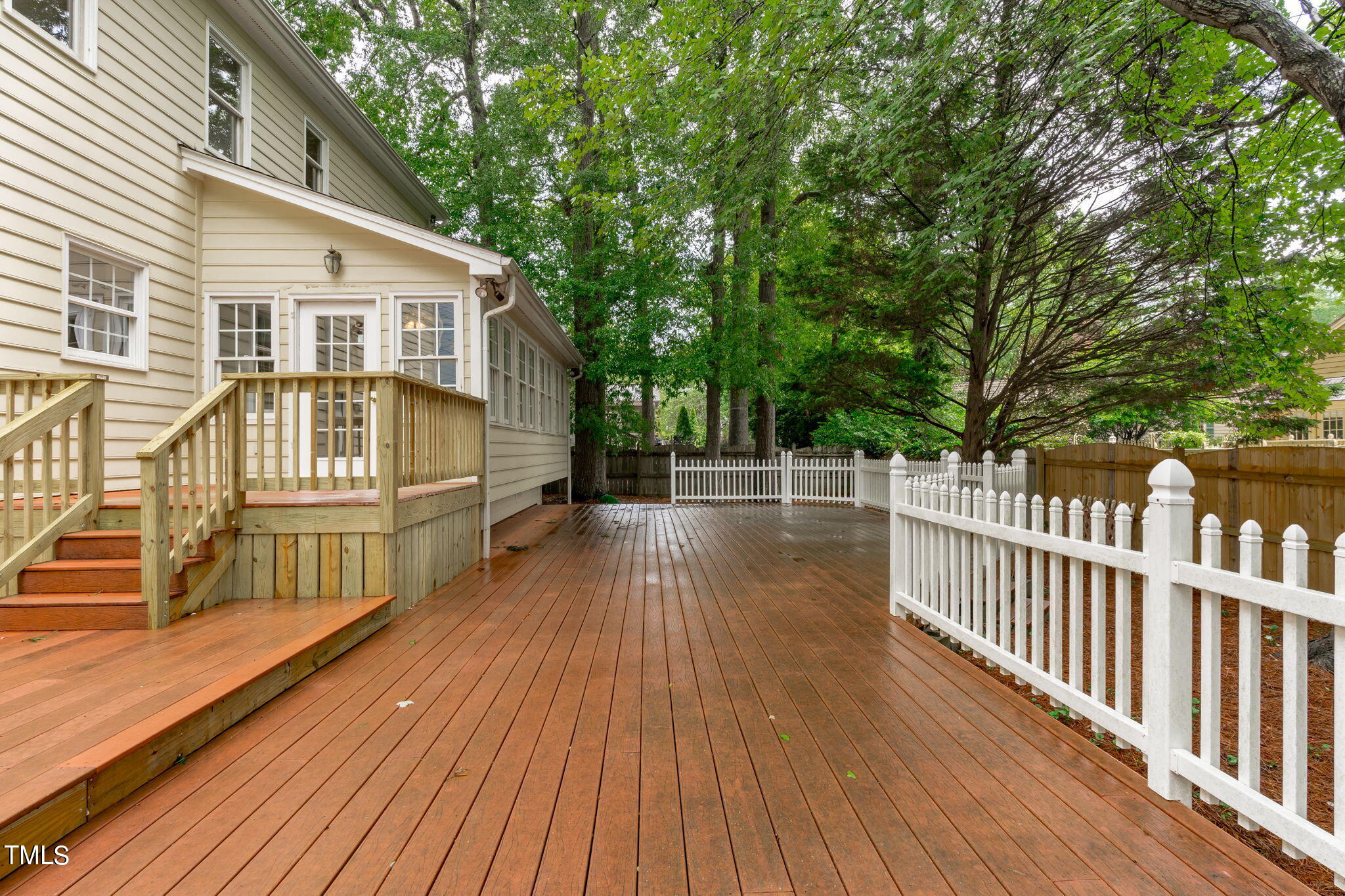206 Palace Green Cary, NC 27518 - Photo 43 of 51 a view of a house with wooden deck
