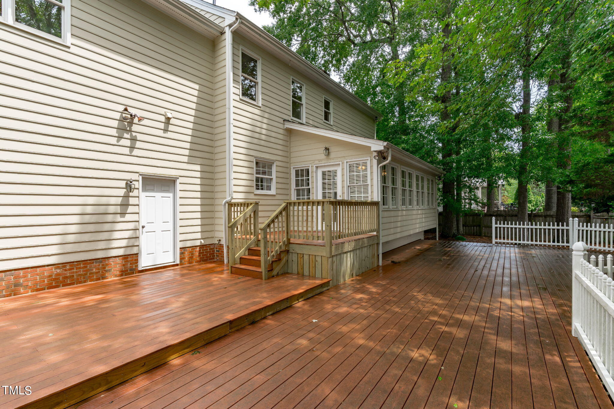 206 Palace Green Cary, NC 27518 - Photo 47 of 51 a view of a house with a backyard