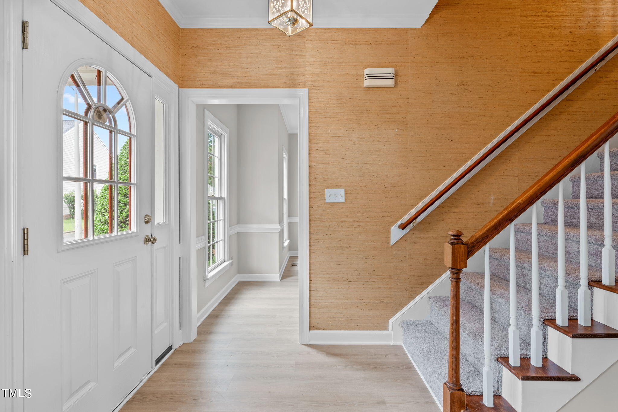 206 Palace Green Cary, NC 27518 - Photo 6 of 51 a view of a hallway with windows and stairs
