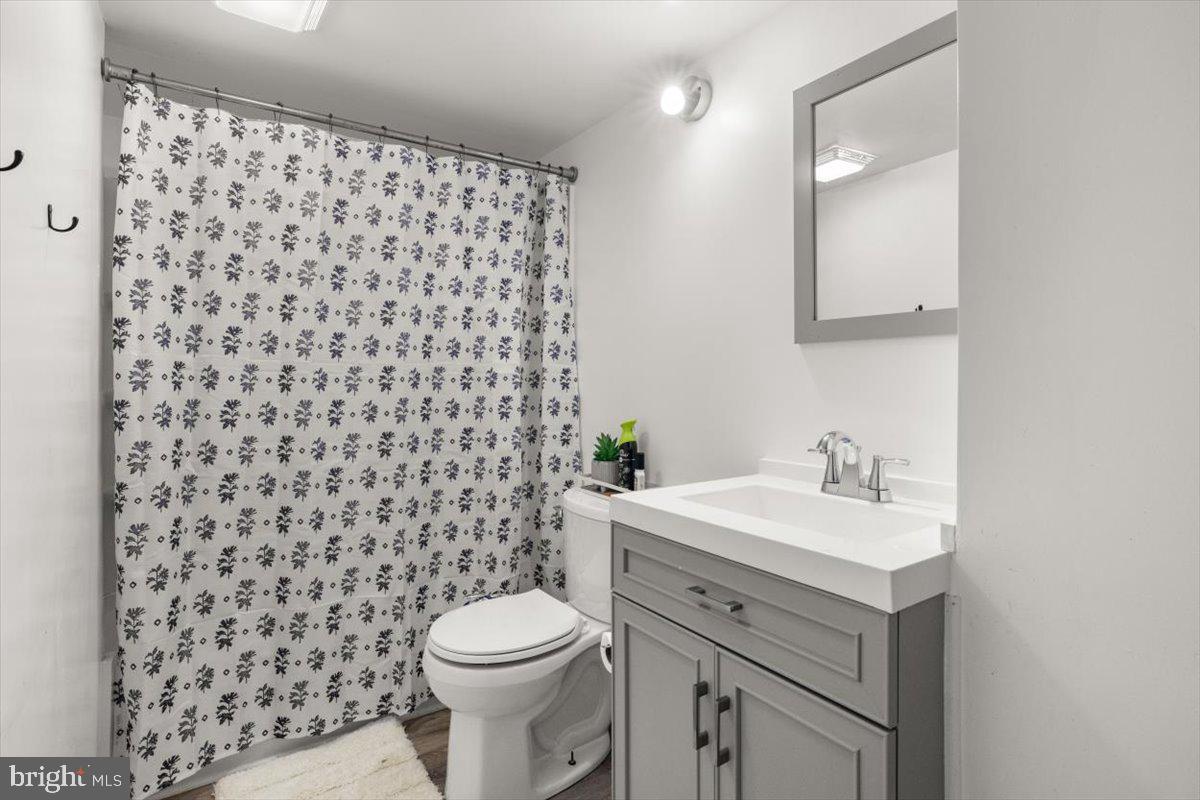 107 Gloucester Road Front Royal, VA 22630 - Photo 12 of 22 a bathroom with a sink toilet and shower