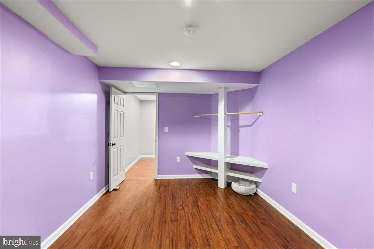 107 Gloucester Road Front Royal, VA 22630 - Photo 13 of 22 a view of a room with wooden floor and bench