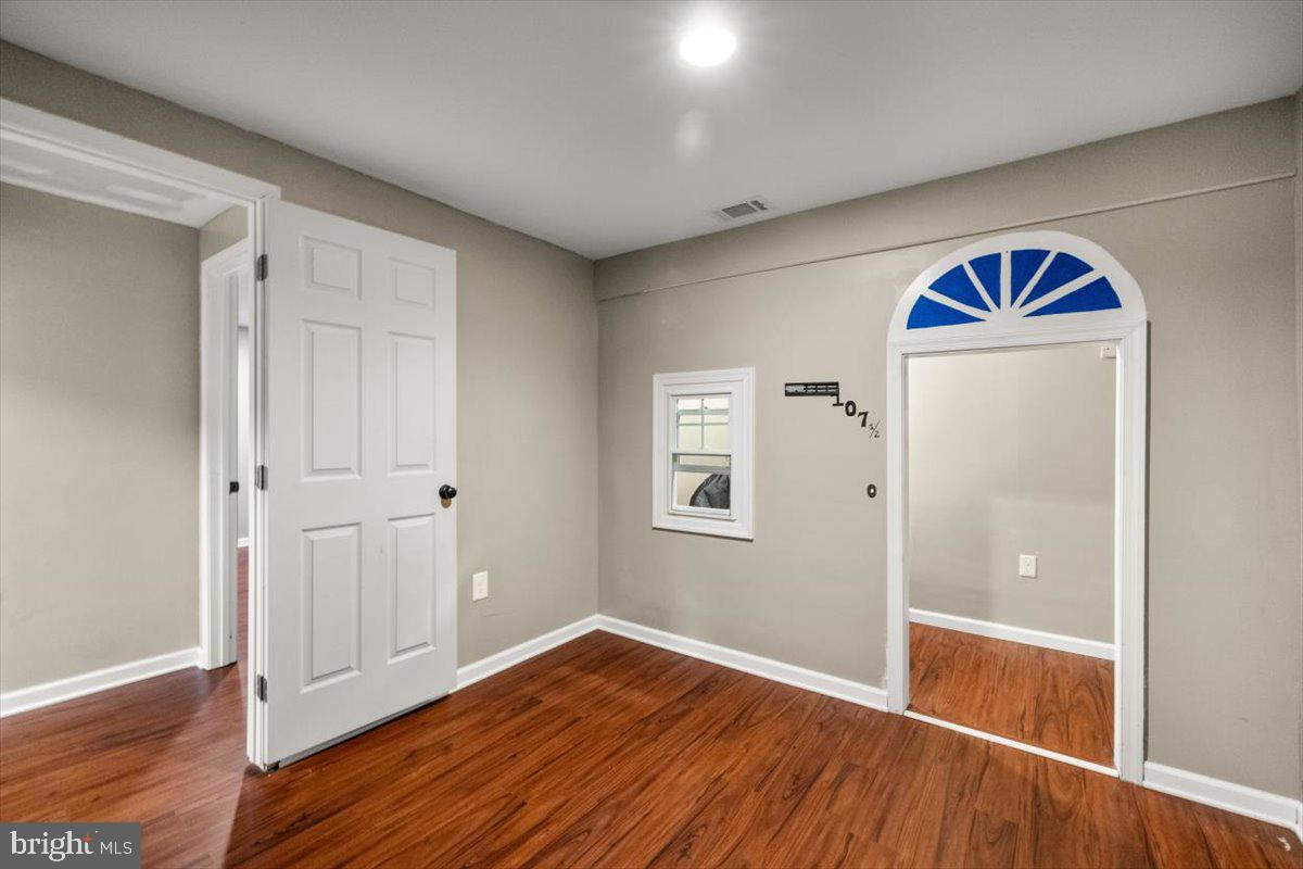 107 Gloucester Road Front Royal, VA 22630 - Photo 15 of 22 wooden floor and windows in a room