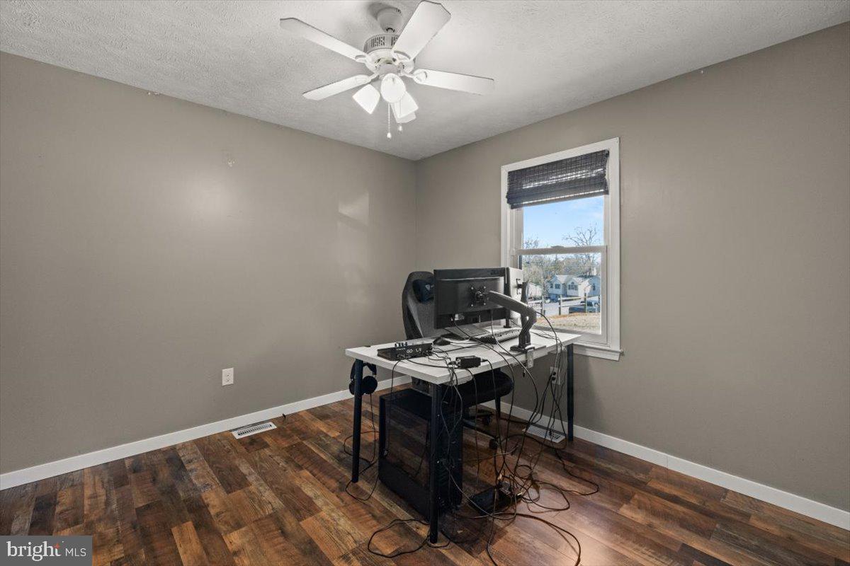 107 Gloucester Road Front Royal, VA 22630 - Photo 9 of 22 a view of workspace with wooden floor