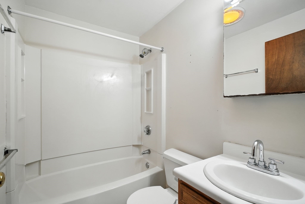 167 Warren Wright Road Belchertown, MA 01007 - Photo 14 of 42 a bathroom with a sink toilet and shower