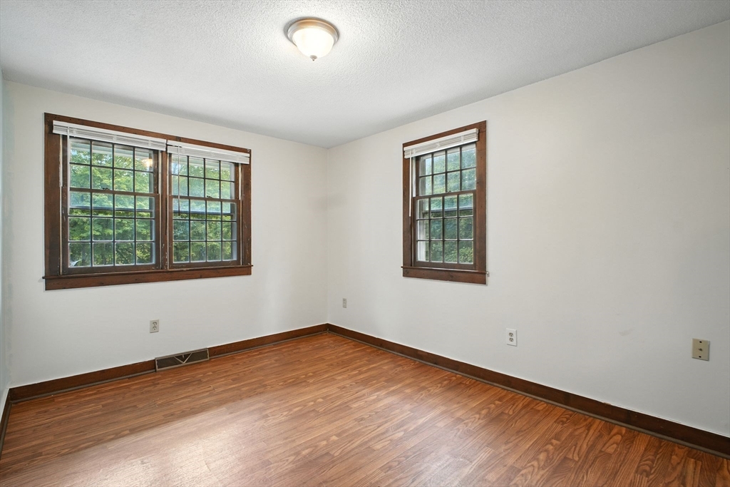 167 Warren Wright Road Belchertown, MA 01007 - Photo 16 of 42 an empty room with a window