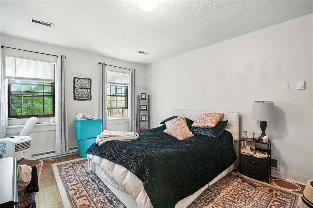 167 Warren Wright Road Belchertown, MA 01007 - Photo 27 of 42 a bedroom with a bed and a window