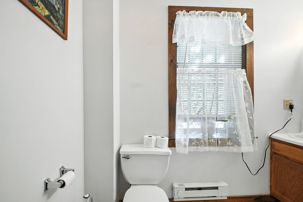 167 Warren Wright Road Belchertown, MA 01007 - Photo 29 of 42 a bathroom with a toilet and a shower