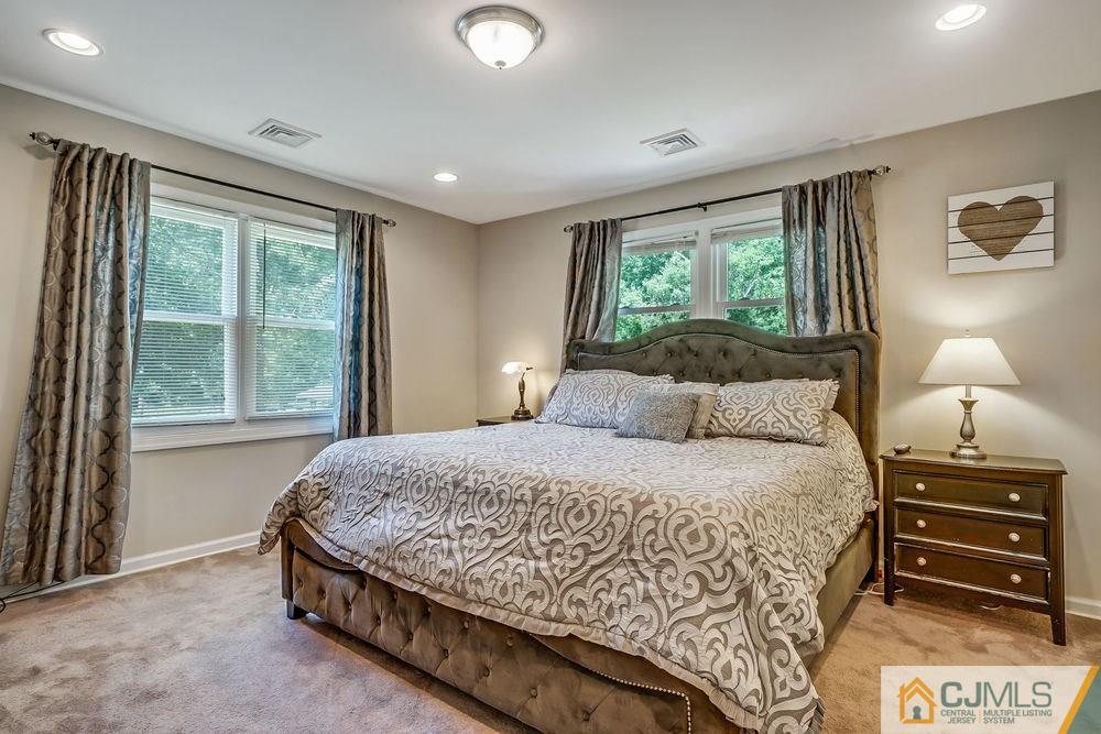 334 Matchaponix Road Old Bridge, NJ 08831 - Photo 11 of 24 a bedroom with a bed and a window