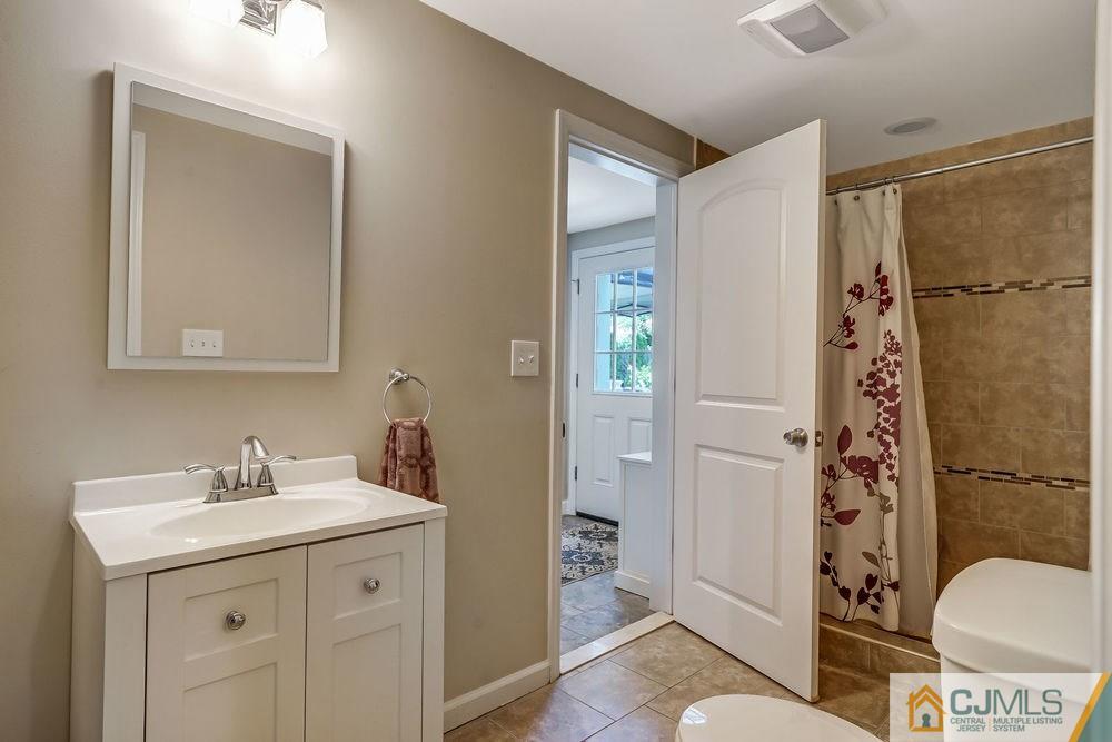 334 Matchaponix Road Old Bridge, NJ 08831 - Photo 15 of 24 a bathroom with a sink toilet and shower