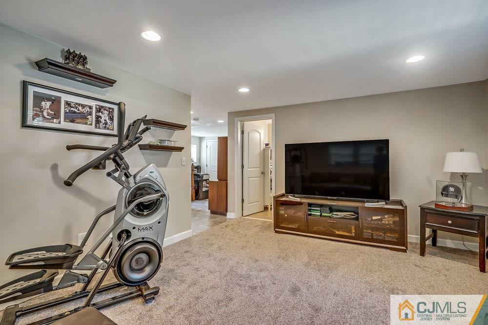 334 Matchaponix Road Old Bridge, NJ 08831 - Photo 18 of 24 a view of a room with gym equipment