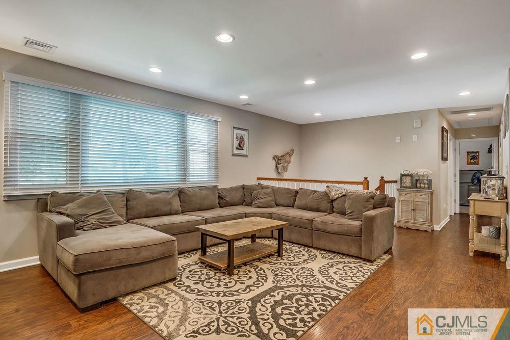 334 Matchaponix Road Old Bridge, NJ 08831 - Photo 4 of 24 a living room with furniture and a window