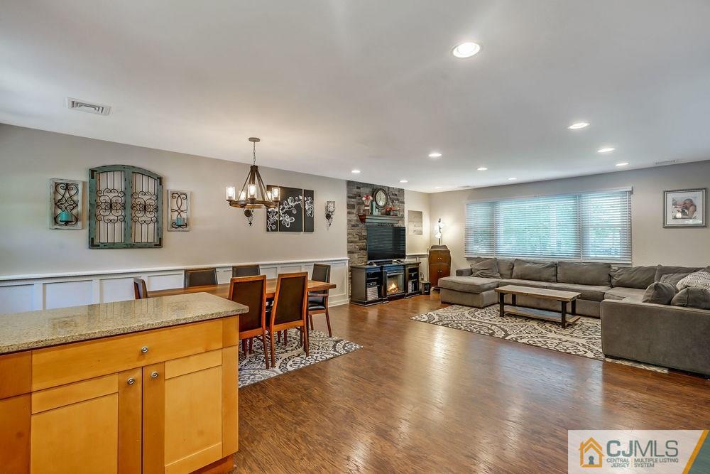 334 Matchaponix Road Old Bridge, NJ 08831 - Photo 9 of 24 a living room with furniture and a wooden floor