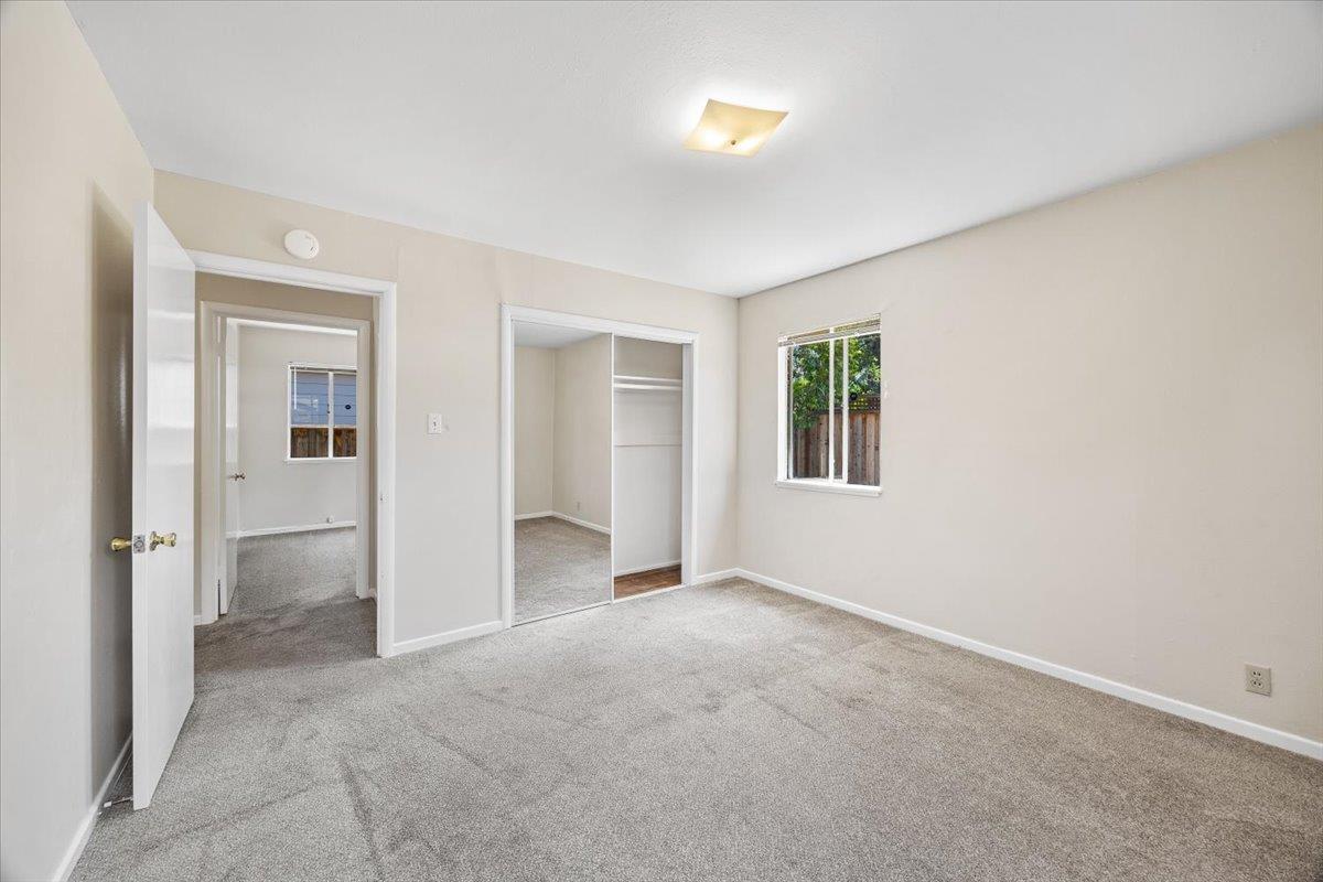 440 Rutherford Avenue Redwood City, CA 94061 - Photo 14 of 19 an empty room with windows and closet
