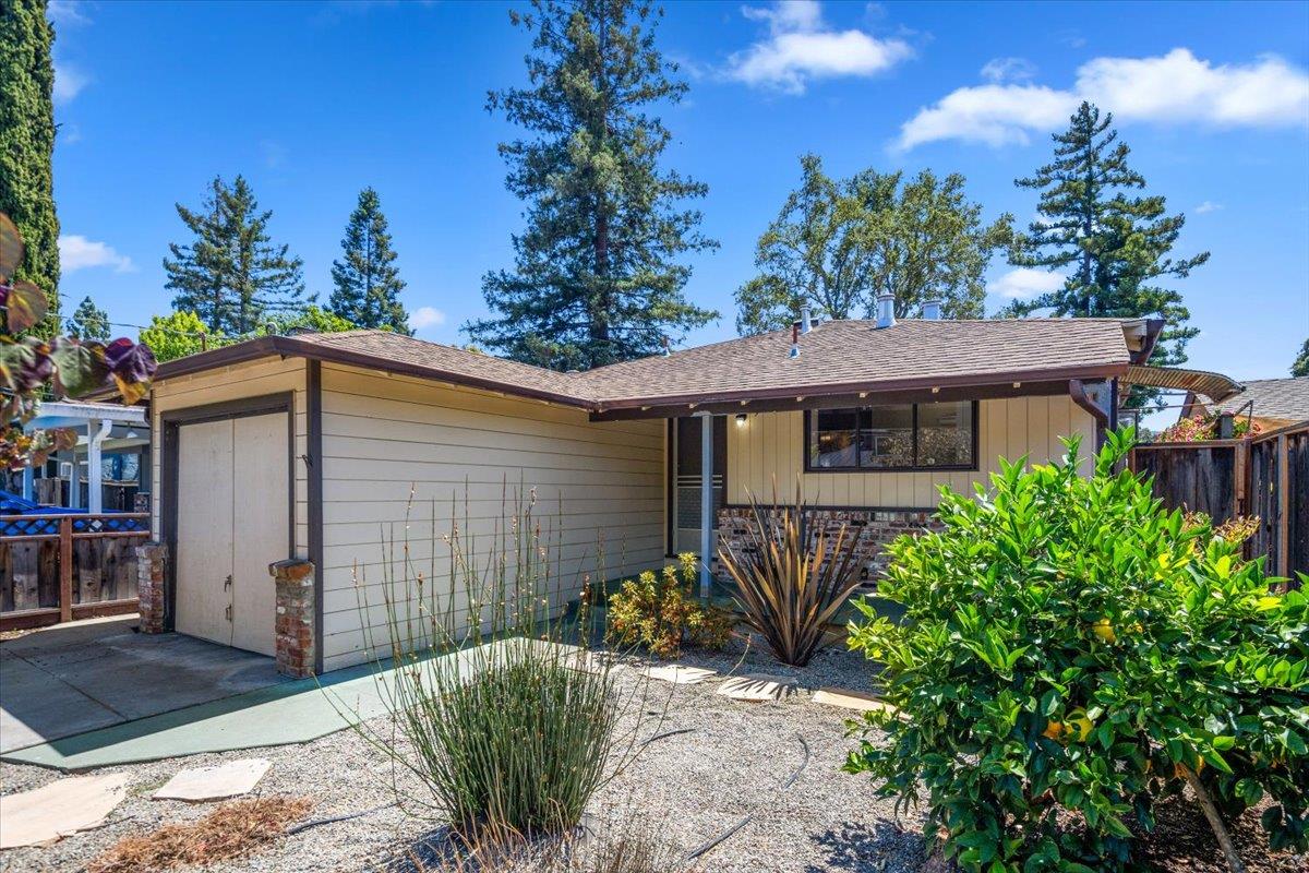 440 Rutherford Avenue Redwood City, CA 94061 - Photo 2 of 19 a view of a house with potted plants
