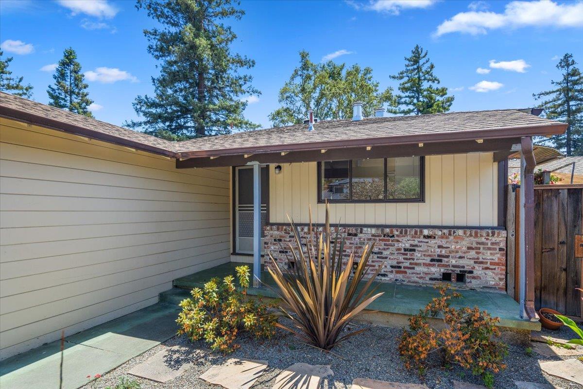440 Rutherford Avenue Redwood City, CA 94061 - Photo 3 of 19 a front view of a house with a yard