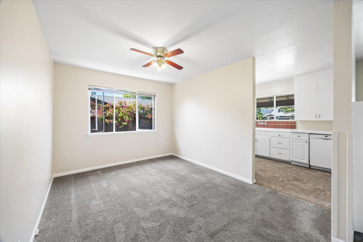 440 Rutherford Avenue Redwood City, CA 94061 - Photo 6 of 19 an empty room with windows and fan