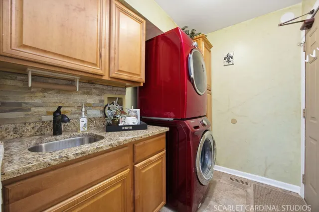a utility room with dryer and washer