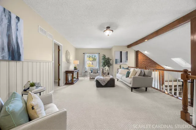 a living room with furniture and a couch