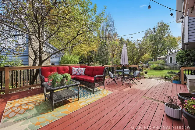 a view of a chairs on wooden deck
