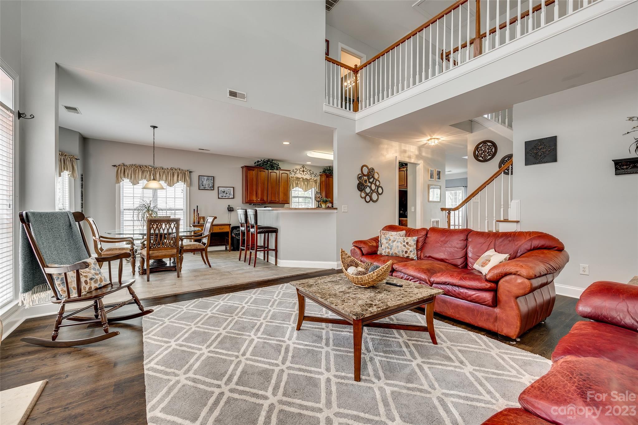 5540 Alexandrite Way Fort Mill, SC 29708 - Photo 11 of 46 a living room with furniture a rug and a flat screen tv