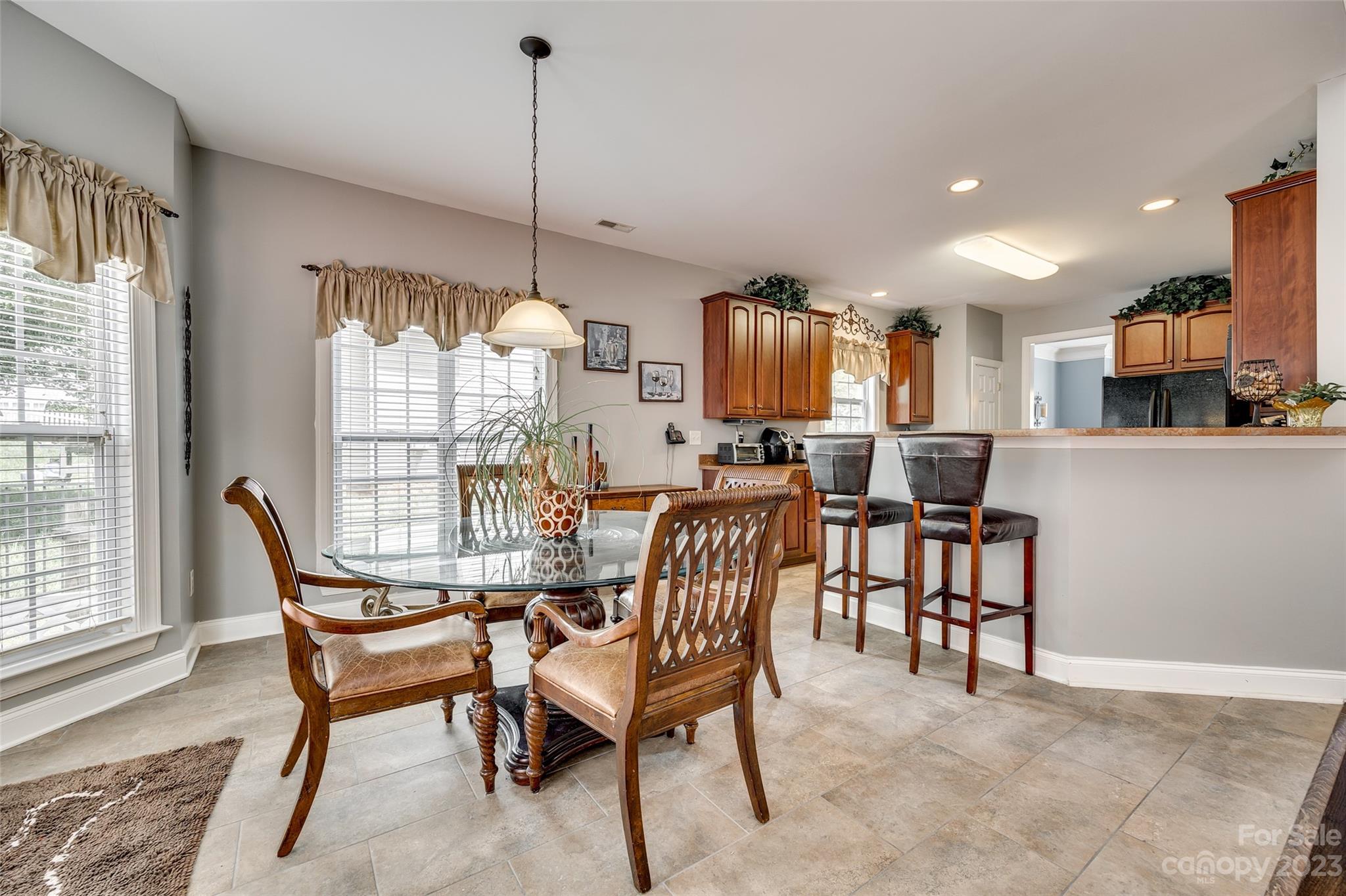 5540 Alexandrite Way Fort Mill, SC 29708 - Photo 13 of 46 a view of a dining room with furniture window and outside view