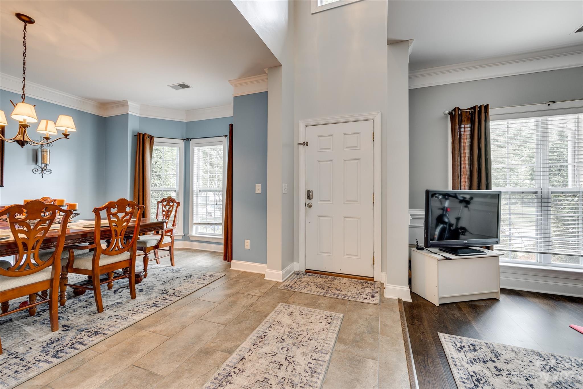 5540 Alexandrite Way Fort Mill, SC 29708 - Photo 3 of 46 a view of a livingroom with furniture and a flat screen tv