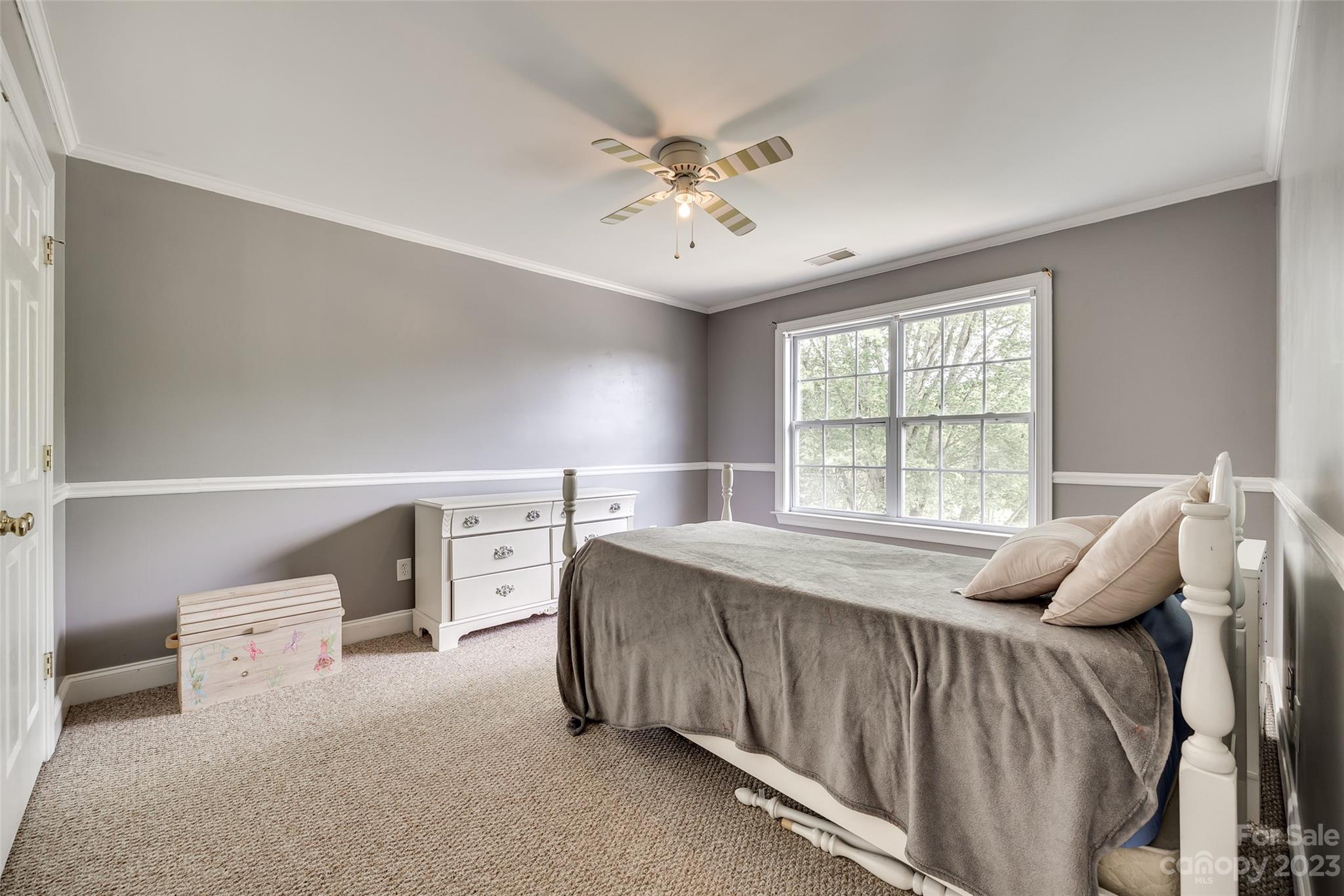 5540 Alexandrite Way Fort Mill, SC 29708 - Photo 31 of 46 a bed room with a bed and a window