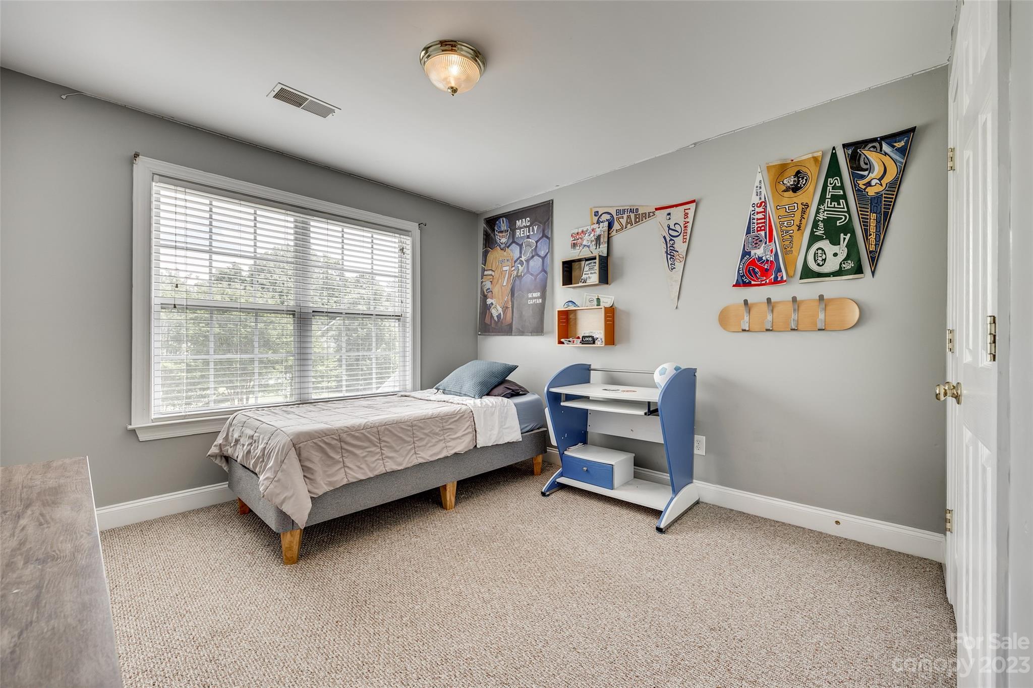 5540 Alexandrite Way Fort Mill, SC 29708 - Photo 33 of 46 a bedroom with a bed and a window