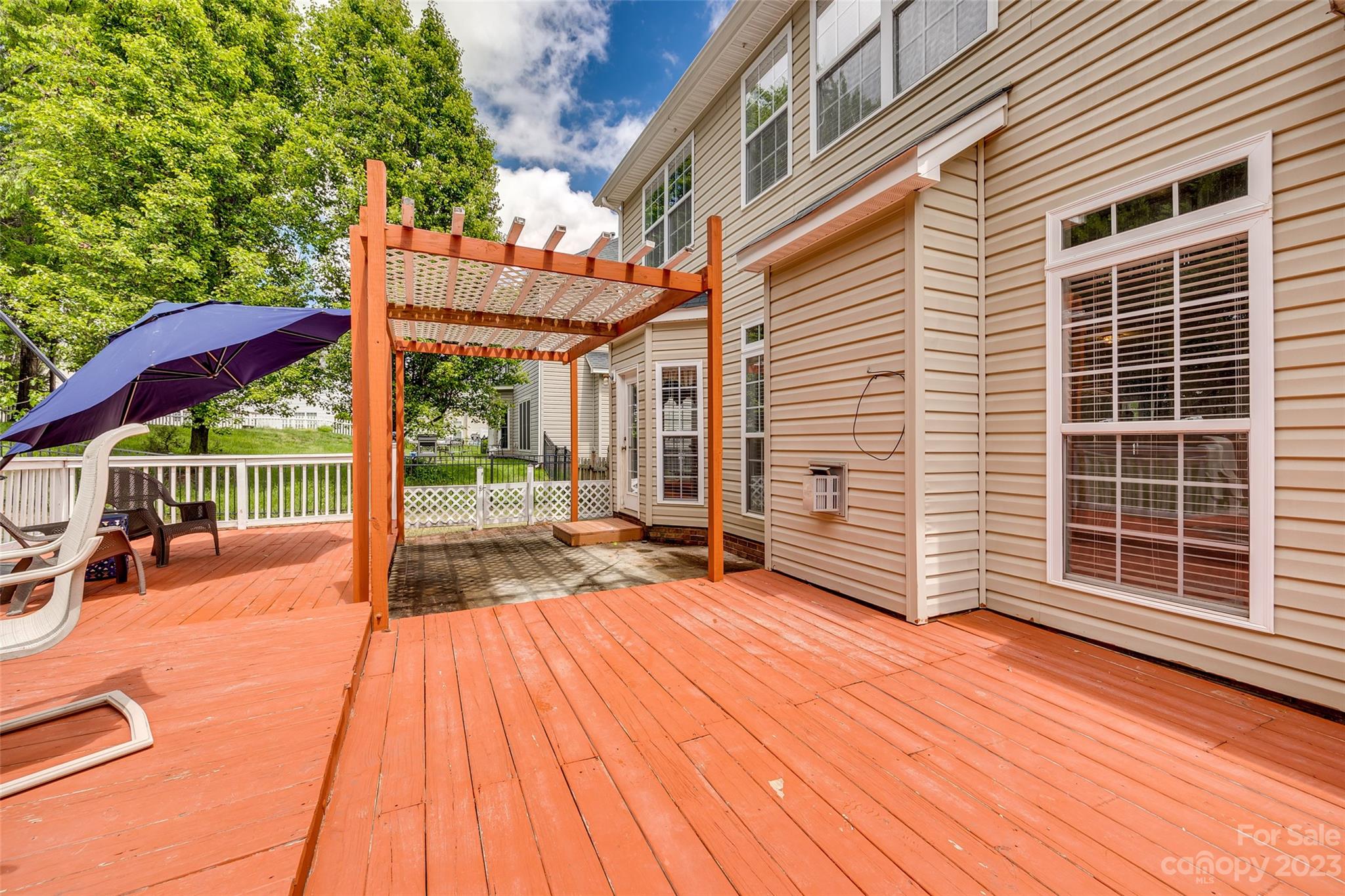 5540 Alexandrite Way Fort Mill, SC 29708 - Photo 36 of 46 a view of backyard with a deck and wooden floor