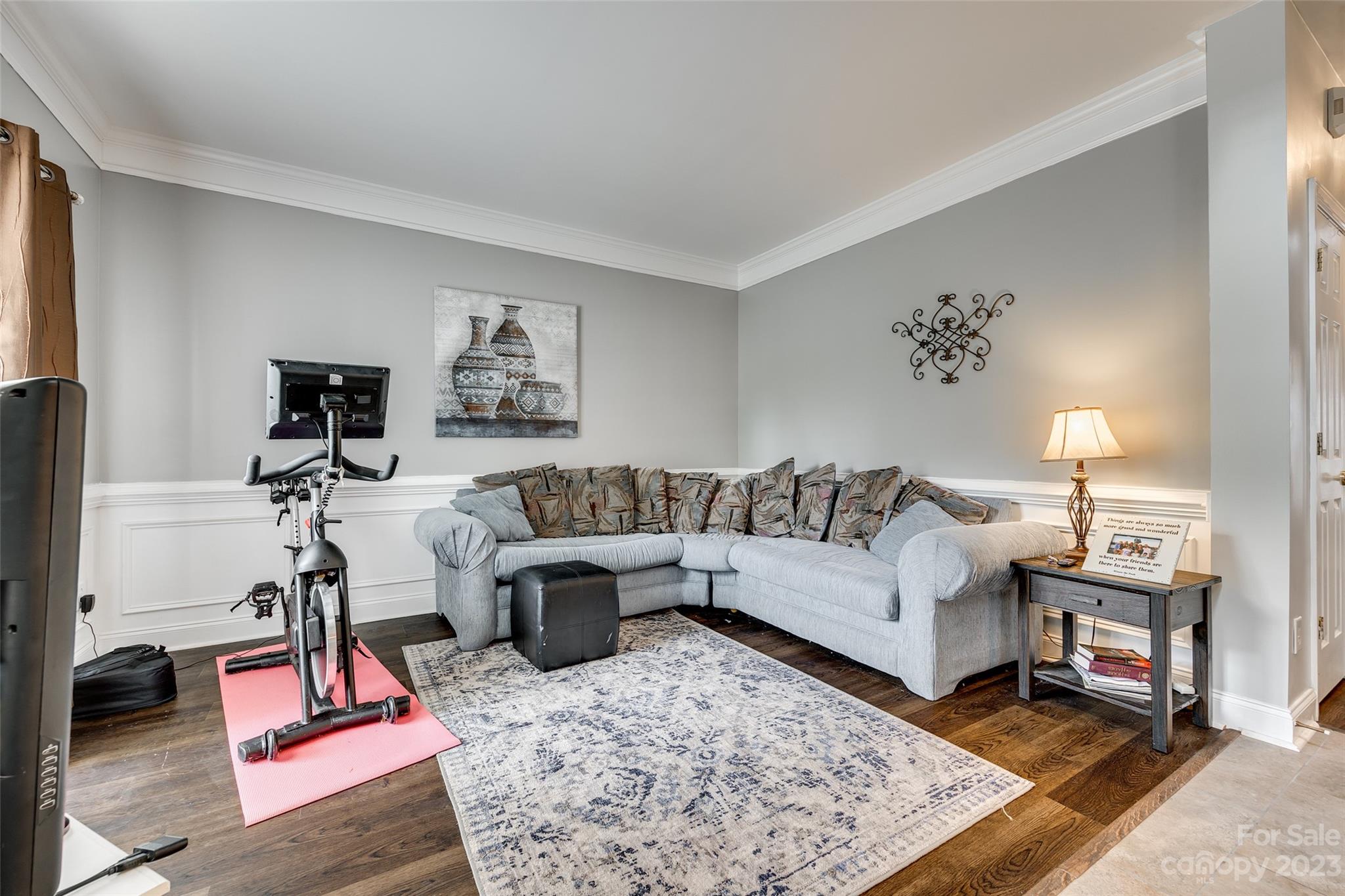 5540 Alexandrite Way Fort Mill, SC 29708 - Photo 5 of 46 a living room with furniture and a flat screen tv